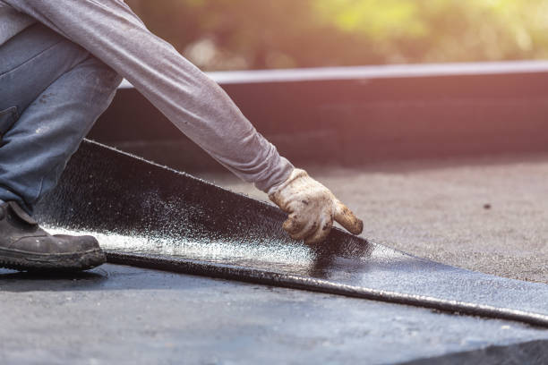 Professional Interior Drainage System technician working in Raymond, WI